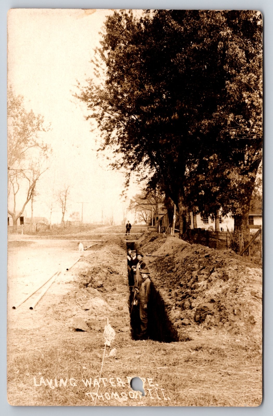 Thomson Illinois Laying Water Pipe Dirt Road As-Is Hole Punch Real Photo RPPC Thomson Illinois Laying Water Pipe Dirt Road As-Is Hole Punch Real Photo RPPC