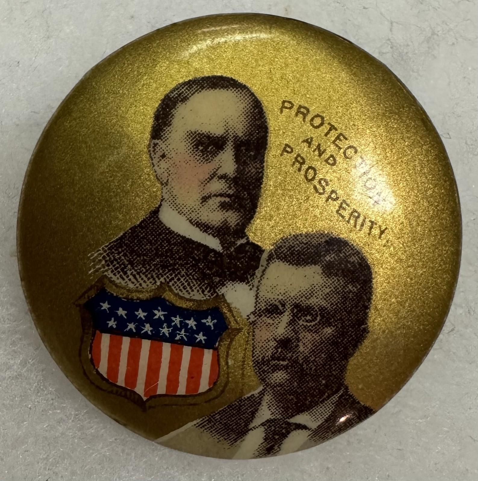 1900 MCKINLEY-ROOSEVELT 1 1/4" VERY RARE "SHIELD" JUGATE BUTTON, NATIONAL BADGE