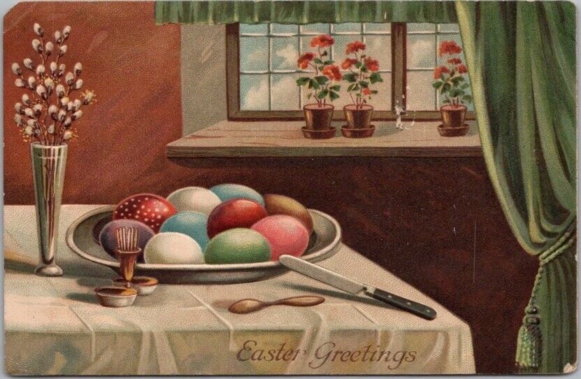 c1910s HAPPY EASTER Embossed Postcard Plate of Colored Eggs on Dinner Table