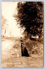 Thomson Illinois Laying Water Pipe Dirt Road As-Is Hole Punch Real Photo RPPC picture